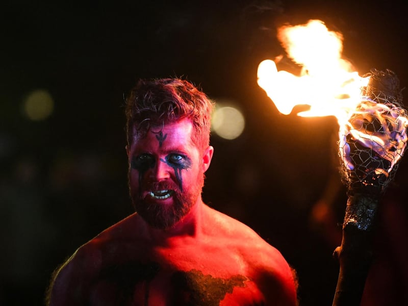 A performer attends the Samhuinn Fire Festival at Holyrood Park. Photo by ANDY BUCHANAN / AFP
