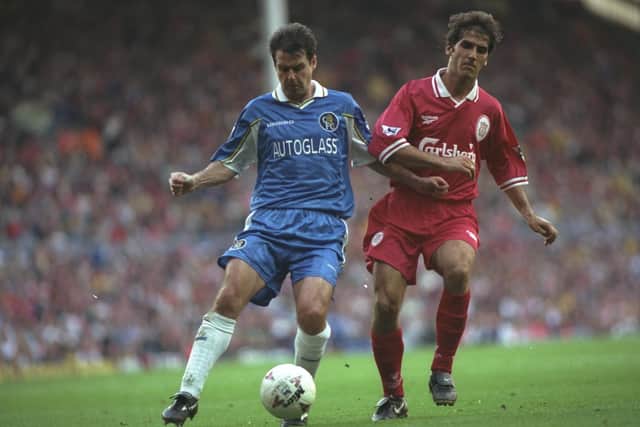 Steve Clarke of Chelsea holds off the challenge of Liverpool's Karl Heinz Riedle during a match at Anfield in 1997. Pic: Clive Brunskill /Allsport