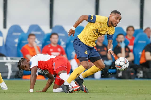 Rangers' Rabbi Matondo and Union's Loic Lapoussin fight for the ball during the Champions League clash in Belgium.