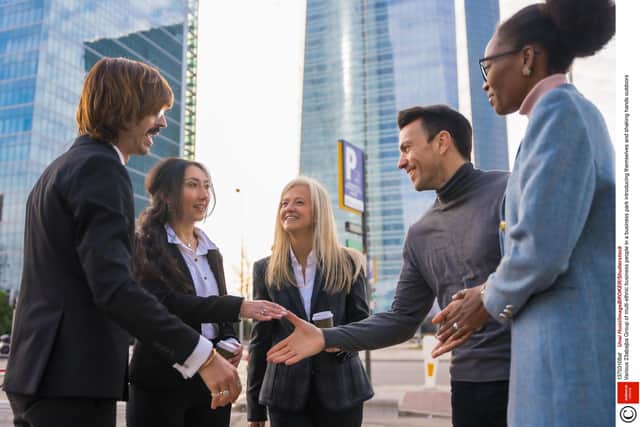 Mandatory Credit: Photo by Unai Huizi/imageBROKER/Shutterstock (13703108af)
Group of multi-ethnic business people in a business park introducing themselves and shaking hands outdoors
Various 23abajba