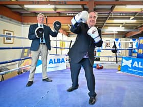 Alba Party leader Alex Salmond poses for a picture with Kenny MacAskill in the Edinburgh boxing gym of former world champion Alex Arthur (Picture: Jeff J Mitchell/Getty Images)