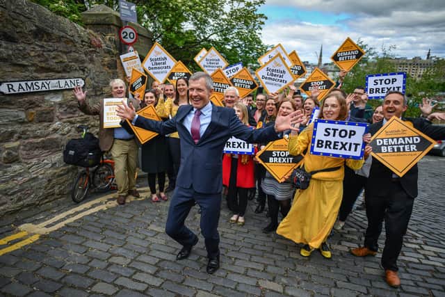 Willie Rennie attends a rally in Edinburgh with Scottish Liberal Democrat supporters in 2019