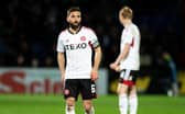 Graeme Shinnie will now miss Aberdeen's next four matches.  (Photo by Mark Scates / SNS Group)