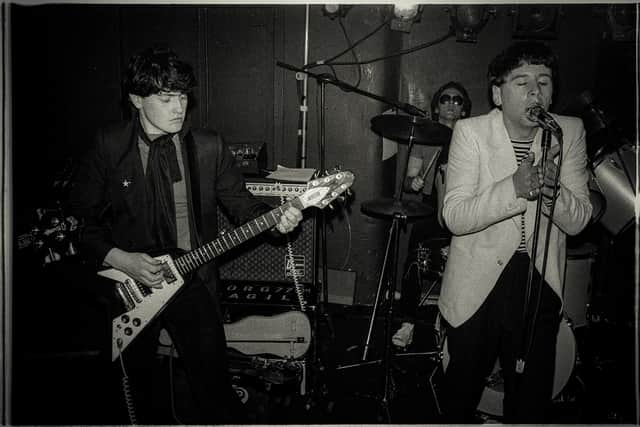 Guitarist Charlie Burchill and singer Jim Kerr, founders of Simple Minds, performing at one of their first gigs in Glasgow in 1978, in a previously unseen archive photograph. Pic: Contributed. Simple Minds' new album 'Direction Of The Heart' is released 21st October (via BMG). Pic: Laurie Evans