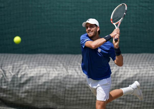 Cameron Norrie practices for today's quarter-final