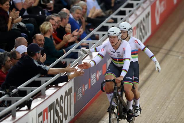 LONDON, ENGLAND - DECEMBER 14: Neil Fachie MBE and his pilot Matt Rotherham of Great Britain celebrate with the crowd after finishing the Mixed Para B Sprint Semifinals during day One of the 2018 TISSOT UCI Track Cycling World Cup at Lee Valley Velopark Velodrome on December 14, 2018 in London, England. (Photo by Naomi Baker/Getty Images)