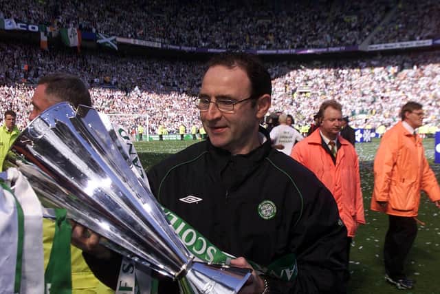 Celtic gaffer Martin O'Neill pictured with the SPL trophy in 2002.