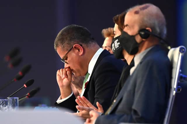 COP26 President Alok Sharma, a Conservative MP, pauses while making a speech in which he apologised for the outcome of the summit (Picture: Jeff J Mitchell/Getty Images)
