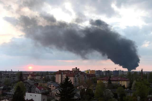 TOPSHOT - Dark smoke rises following an air strike in the western Ukrainian city of Lviv, on May 3, 2022. (Photo by Yuriy Dyachyshyn / AFP) (Photo by YURIY DYACHYSHYN/AFP via Getty Images)