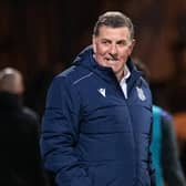 Mark McGhee picked up his first win as Dundee boss against Hibs.