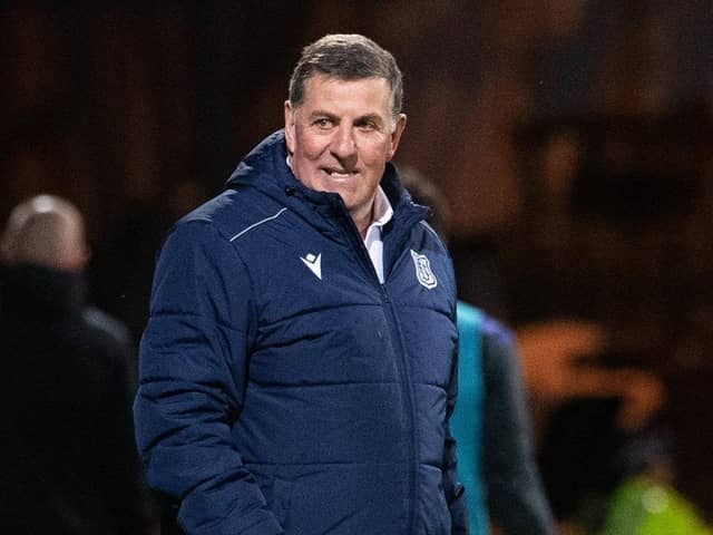 Mark McGhee picked up his first win as Dundee boss against Hibs.