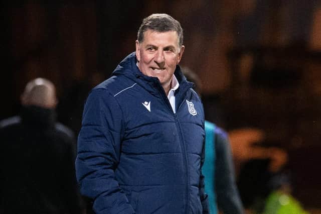 Mark McGhee picked up his first win as Dundee boss against Hibs.