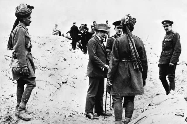 Indian soldiers talk to the then Secretary of State for War, David Lloyd George, near the front during the Battle of the Somme in 1916 (Picture: PA)