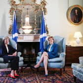 The Bute House Union Flag was apparently in the wash when Theresa May visited Nicola Sturgeon in 2016 (Picture: Getty)