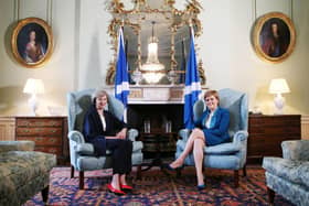The Bute House Union Flag was apparently in the wash when Theresa May visited Nicola Sturgeon in 2016 (Picture: Getty)