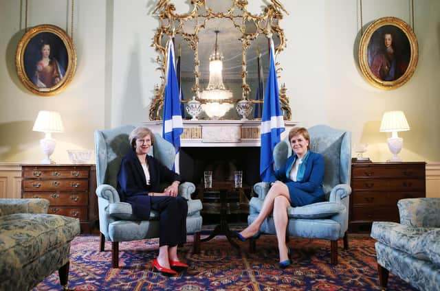 The Bute House Union Flag was apparently in the wash when Theresa May visited Nicola Sturgeon in 2016 (Picture: Getty)