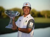 South Korea's Tom Kim poses with the trophy after winning the Shriners Children's Open at TPC Summerlin in Las Vegas. Picture: Orlando Ramirez/Getty Images.