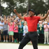 Tiger Woods celebrates on the 18th green after winning the Masters in 2019. (Photo by Andrew Redington/Getty Images)