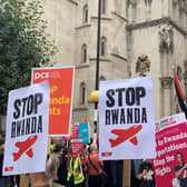 Demonstrators outside the Royal Courts of Justice, central London, protesting against the Government's plan to send some asylum seekers to Rwanda.