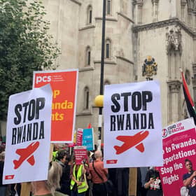 Demonstrators outside the Royal Courts of Justice, central London, protesting against the Government's plan to send some asylum seekers to Rwanda.