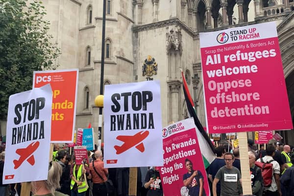 Demonstrators outside the Royal Courts of Justice, central London, protesting against the Government's plan to send some asylum seekers to Rwanda.