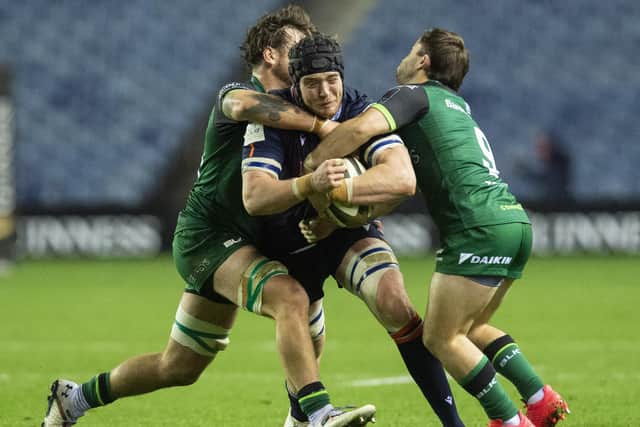 Edinburgh's Andrew Davidson tries to find a way through the Connacht defence.