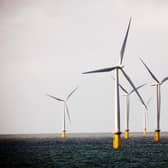 The report says the oil and gas sector can accelerate the growth of renewables (file image). Picture: AP Photo/Jasper Carlberg/Polfoto.