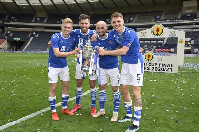 Ali McCann (left) and Jason Kerr (right), pictured alongside Callum Booth and Chris Kane after St Johnstone's Scottish Cup triumph in May, were both sold on transfer deadline day. Picture: SNS