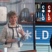 First Minister Nicola Sturgeon beside a screen which was been erected around tables during a visit to Cold Town House in Edinburgh's Grassmarket in July 2020.