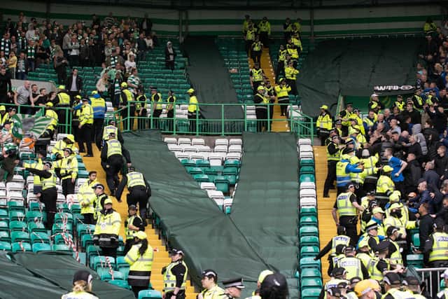 Fans clash at full-time after the 1-1 draw between Celtic and Rangers at Celtic Park. (Photo by Alan Harvey / SNS Group)