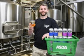 Elliot Lamb of Edinburgh's Bellfield Brewery, raising a glass to the new supply deal with Asda. Picture: Ian Georgeson