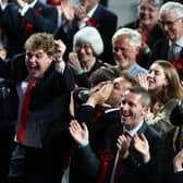 Labour supporters celebrate as exit polls predict the party's landslide election win (Picture: Jeff J Mitchell/Getty Images)