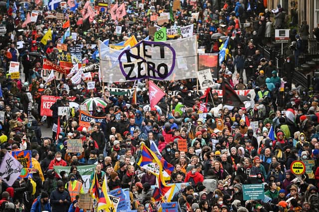 The Global Day of Action for Climate Justice march during the COP26 conference in Glasgow. (Photo by Jeff J Mitchell/Getty Images)