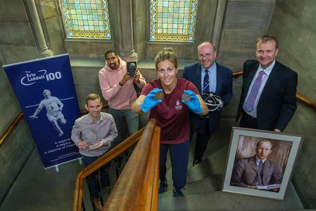 Olympic silver medalist and teacher Gemma Burton holding two of Eric Liddell’s Olympic medals with (far left) Colin Hutchison, CEO, Scottish Athletics; Kieron Achara, former Olympic basketball player and broadcaster with the commemoration of Eric’s induction into the Scottish Rugby’s Hall of Fame; Graham Law, Senior Corporate Affairs and Stakeholder Manager at Scottish Rugby (second right) holding Eric Liddell’s reissued Scottish International rugby cap and (far right) John MacMillan, CEO, The Eric Liddell Community