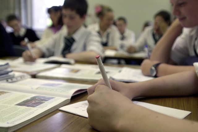 Medics are calling for air monitors to be installed in Scottish schools to examine pollution risk to children