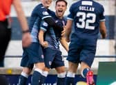 Lewis Vaughan, centre, celebrates scoring his second goal against Dunfermline.