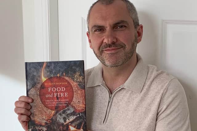 Carlo Crolla with his copy of Food and Fire