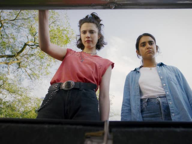 Margaret Qualley and Geraldine Viswanathan in Ethan Coen's Drive-Away Dolls PIC: Courtesy of Working Title / Focus Features