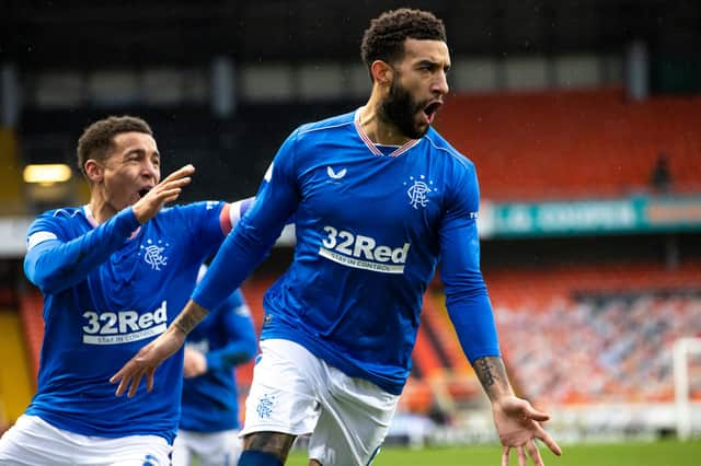 Rangers Connor Goldson celebrates with fellow defender James Tavernier.