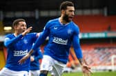 Rangers Connor Goldson celebrates with fellow defender James Tavernier.