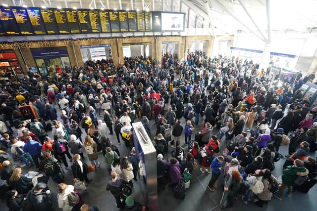 Passengers at King's Cross station in London following a strike by members of the Rail, Maritime and Transport union (RMT), in a long-running dispute over jobs and pensions. Picture: James Manning/PA Wire