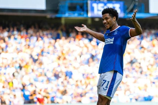 Malik Tillman celebrates making it 1-0 with another header against St Johnstone. (Photo by Craig Williamson / SNS Group)