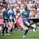 Finn Russell kicked 14 points as Racing 92 defeated Stade Francais 33-20 in the Top 14 quarter-finals.