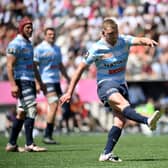 Finn Russell kicked 14 points as Racing 92 defeated Stade Francais 33-20 in the Top 14 quarter-finals.