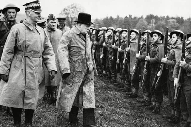 Winston Churchill with General Wladyslaw Sikorsky, Polish Premier and War Minister, (left) inspects Polish troops in Scotland in 1940 . PIC:: AP/Shutterstock (7410008a)