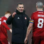 Aberdeen manager Stephen Glass (left) congratulates his skipper Scott Brown after the 1-0 win over St Johnstone (Photo by Craig Williamson / SNS Group)