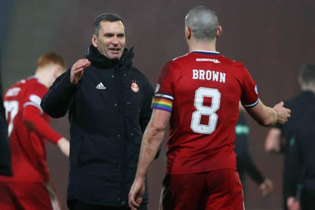 Aberdeen manager Stephen Glass (left) congratulates his skipper Scott Brown after the 1-0 win over St Johnstone (Photo by Craig Williamson / SNS Group)
