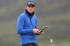 Nairn's Calum Scott, Scotland's top-placed player in the World Amateur Golf Ranking, checks his yardage book at Ballyliffin Golf Club. Picture: Oisin Keniry/R&A/R&A via Getty Images.