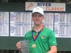 Midland College player Gregor Graham shows off the trophy after his win in the Bosque River Classic in Waco, Texas.
