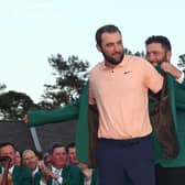 Scottie Scheffler receives his Green Jacket from 2023 winner Jon Rahm of Spain after becoming a multiple Masters champion at Augusta National last Sunday. Picture: Jamie Squire/Getty Images.